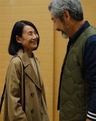 Couple engaging in happy conversation